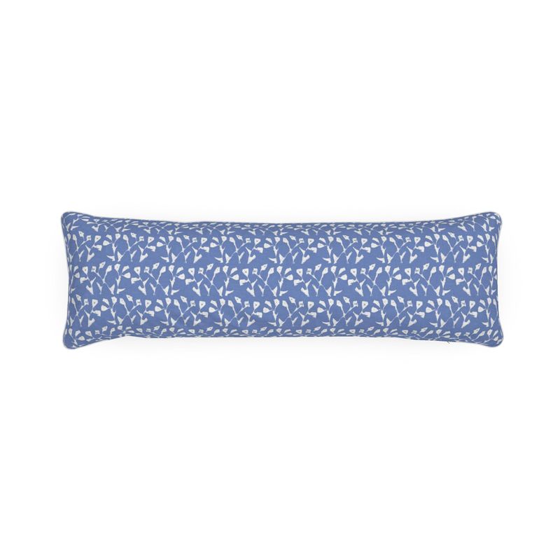 Blue decorative pillow with white pattern on a white background