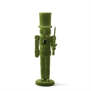An olive green nutcracker figurine holding a sword, standing on a circular base against a plain white background.
