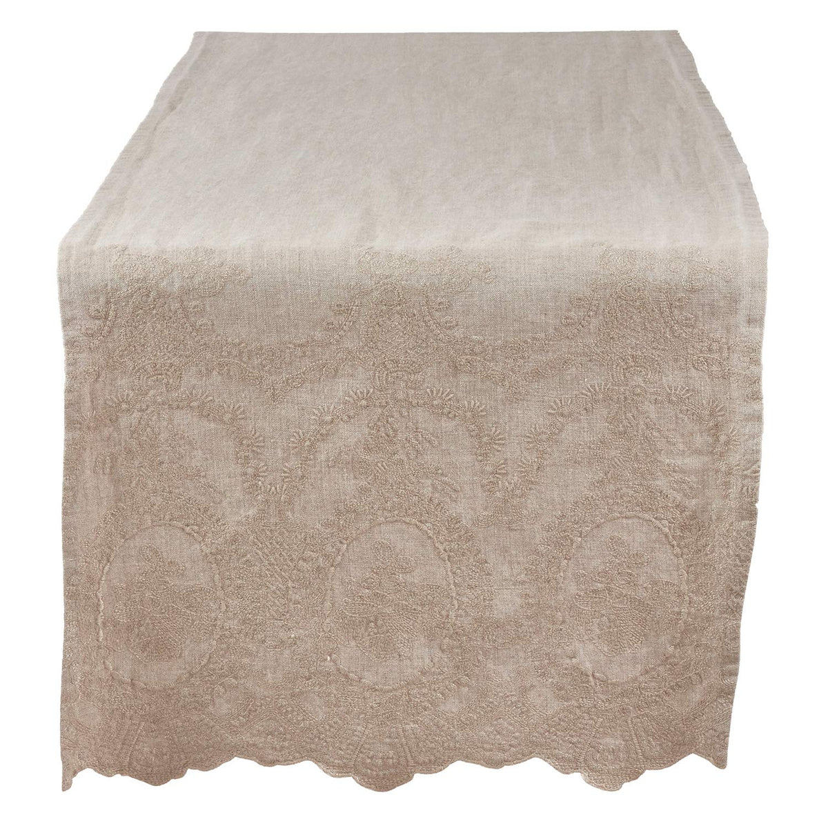 A beige table runner with a scalloped edge and raised floral damask pattern, shown flat against a white background.