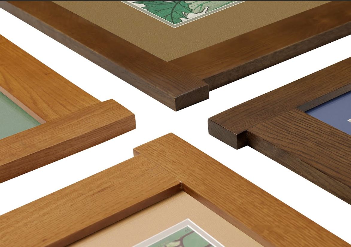 Close-up of wooden picture frames with a white background