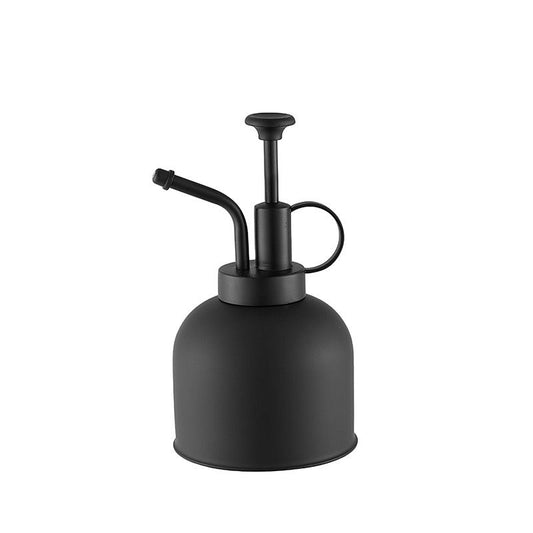 Black spray bottle on a white background