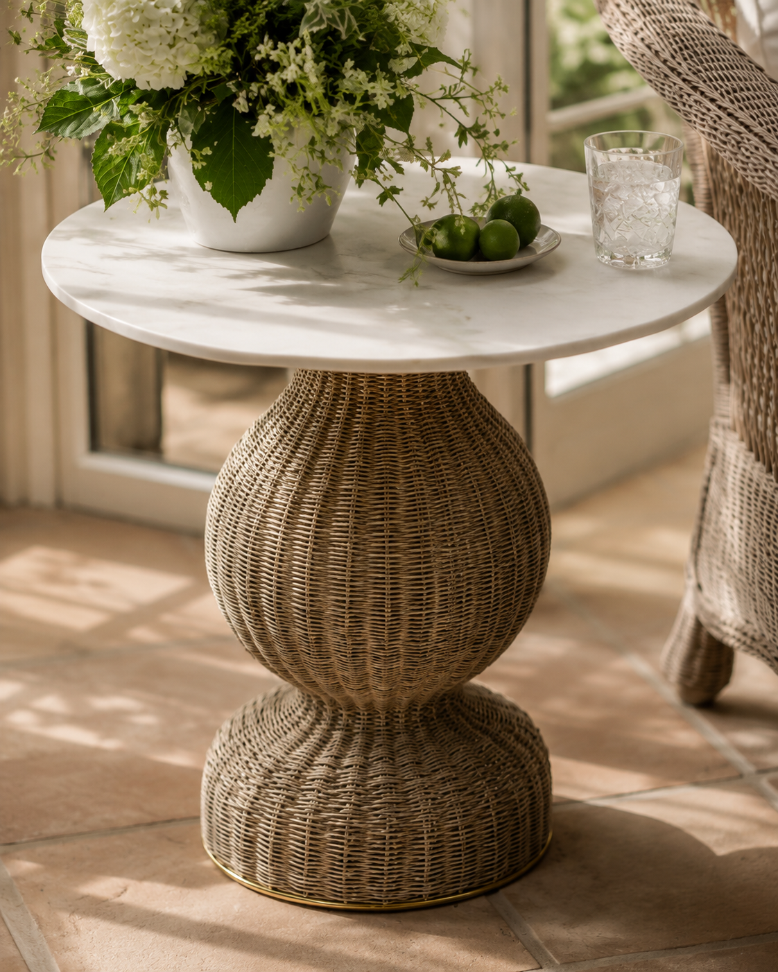 The Wren Marble & Woven Pedestal Dining Table