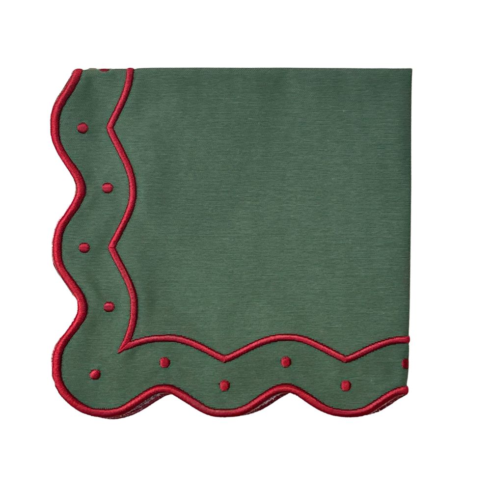 A square dark green napkin with a decorative red scalloped border and red embroidered dots, shown flat against a white background.