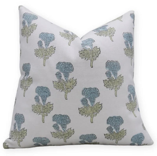 Decorative pillow with floral pattern on a white background