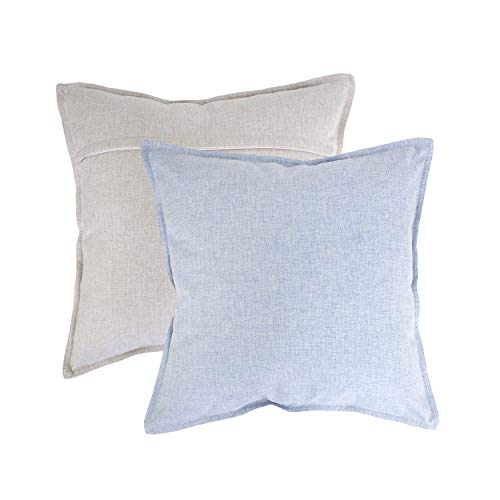 Two square throw pillows in a linen-like fabric, one in light beige and one in light blue, shown on a plain white background.