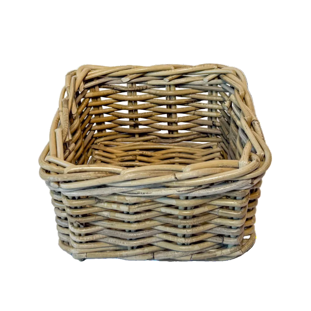 Woven rattan basket on a white background