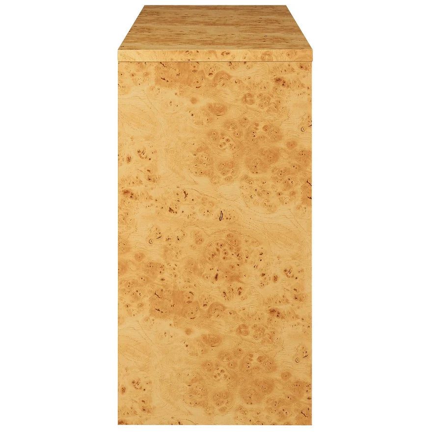 A rectangular pedestal or plinth with a natural burl wood grain finish in warm tan and golden-brown tones, shown against a plain white background.