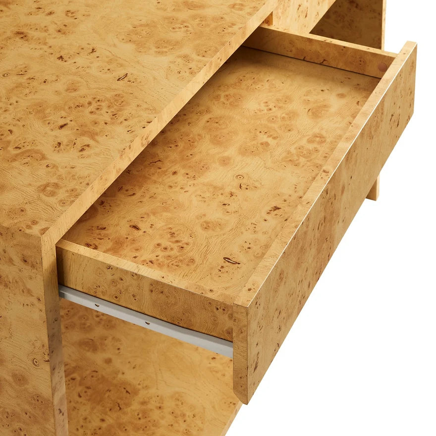 Wooden desk with an open drawer on a white background