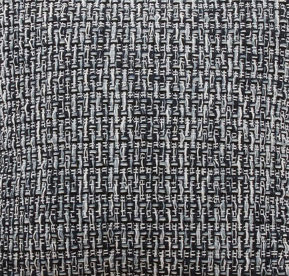 A close-up of a black and white textured tweed fabric with a woven basketweave pattern.