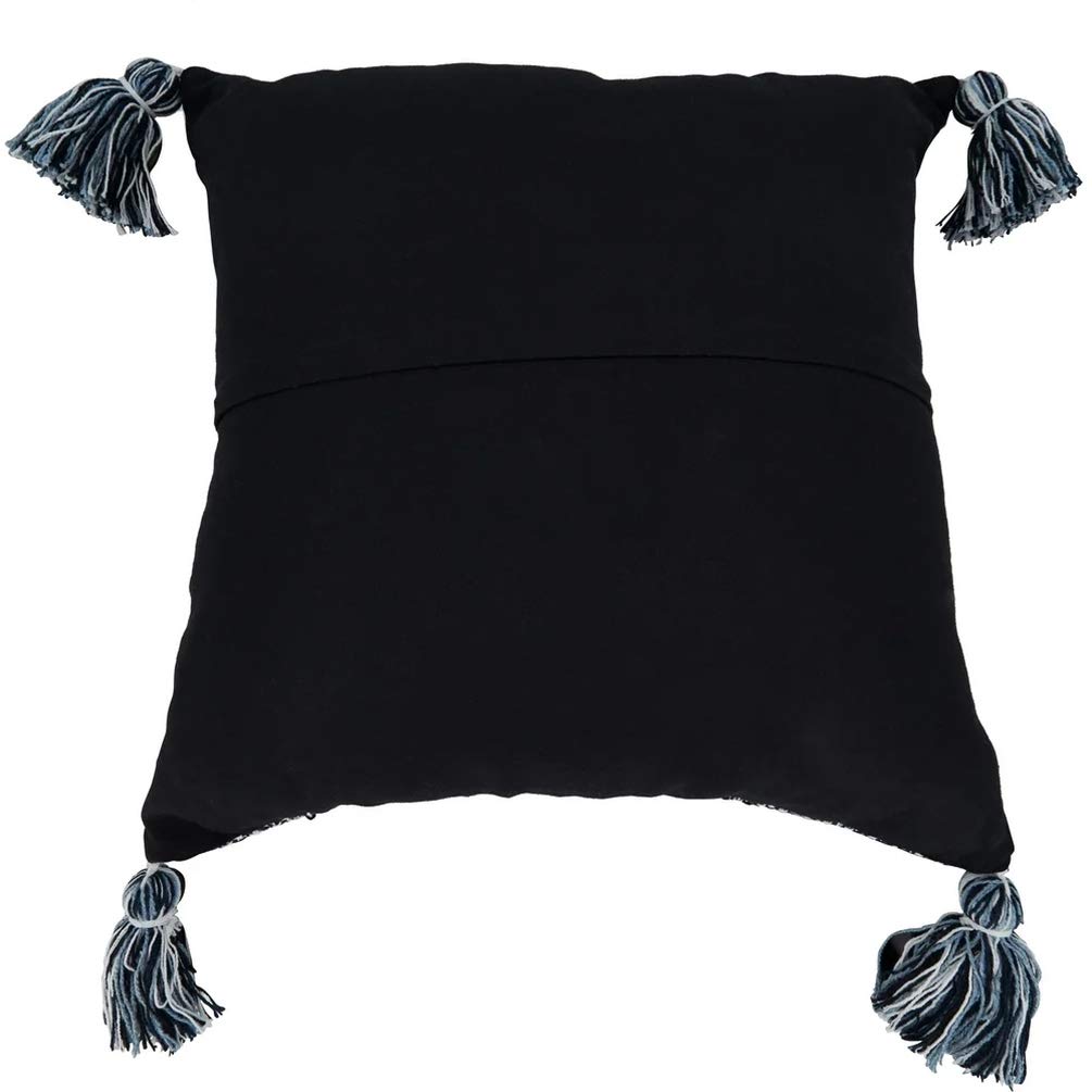 Black pillow with tassels on a white background