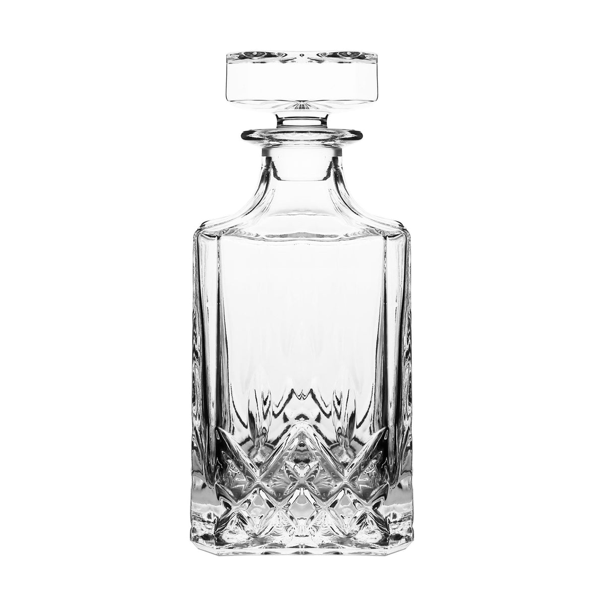 Clear glass decanter with diamond cut pattern on a white background