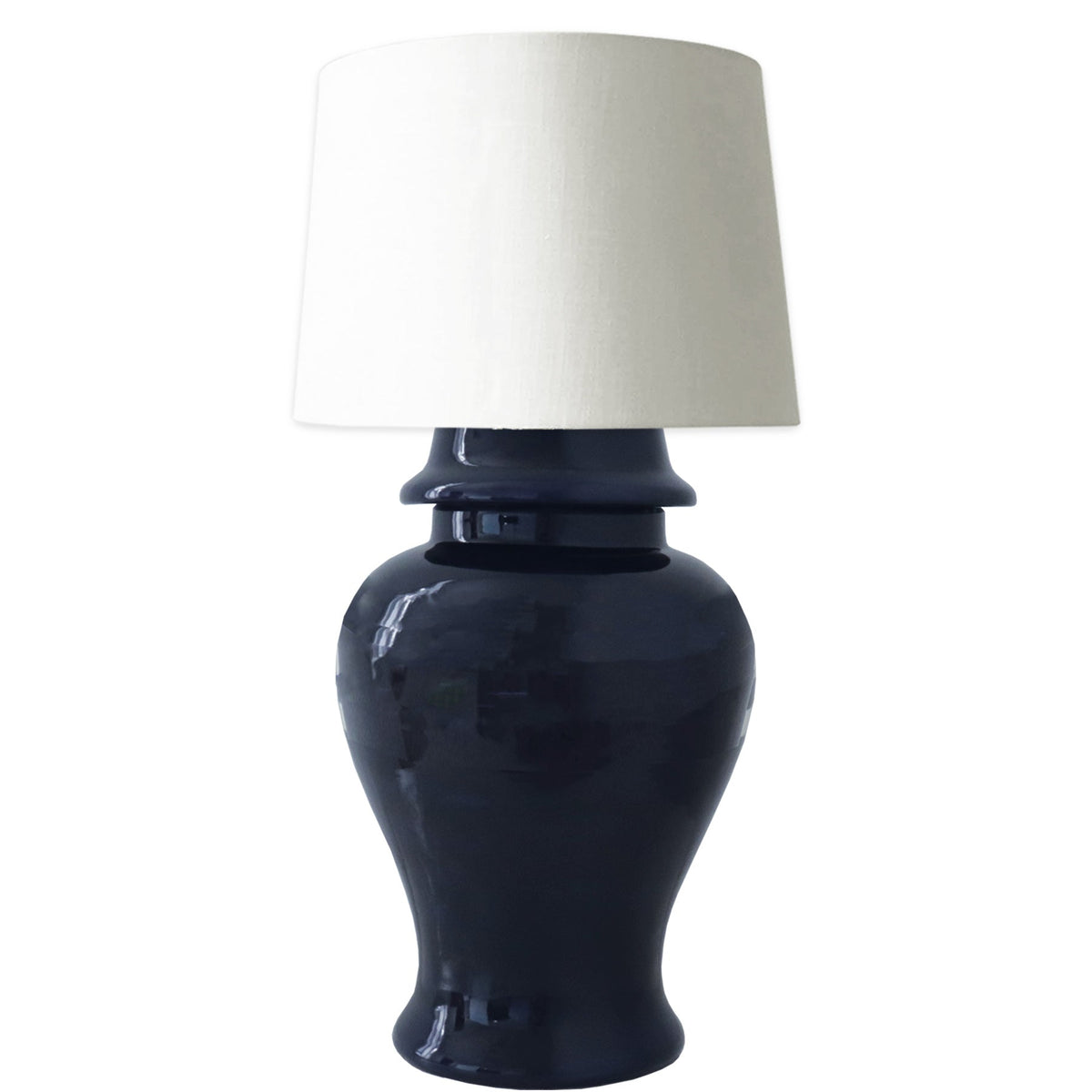 Black table lamp with a white lampshade on a white background