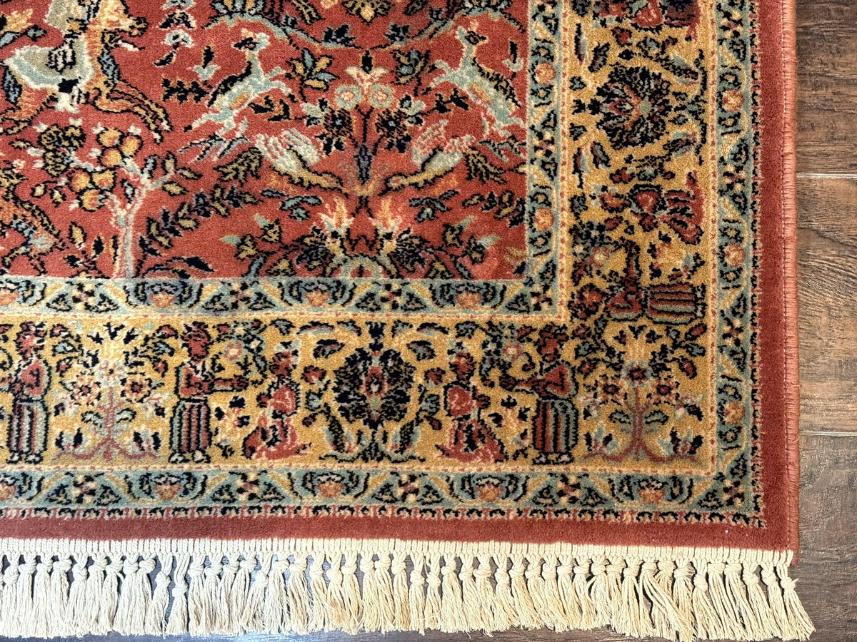 Decorative rug with intricate patterns on a wooden floor