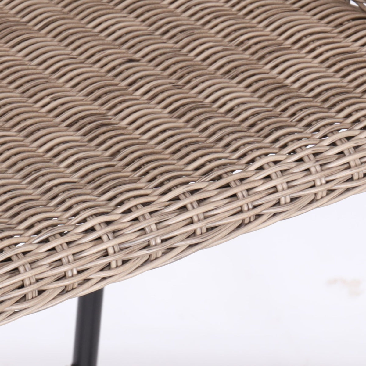 Close-up of a wicker chair with a white background