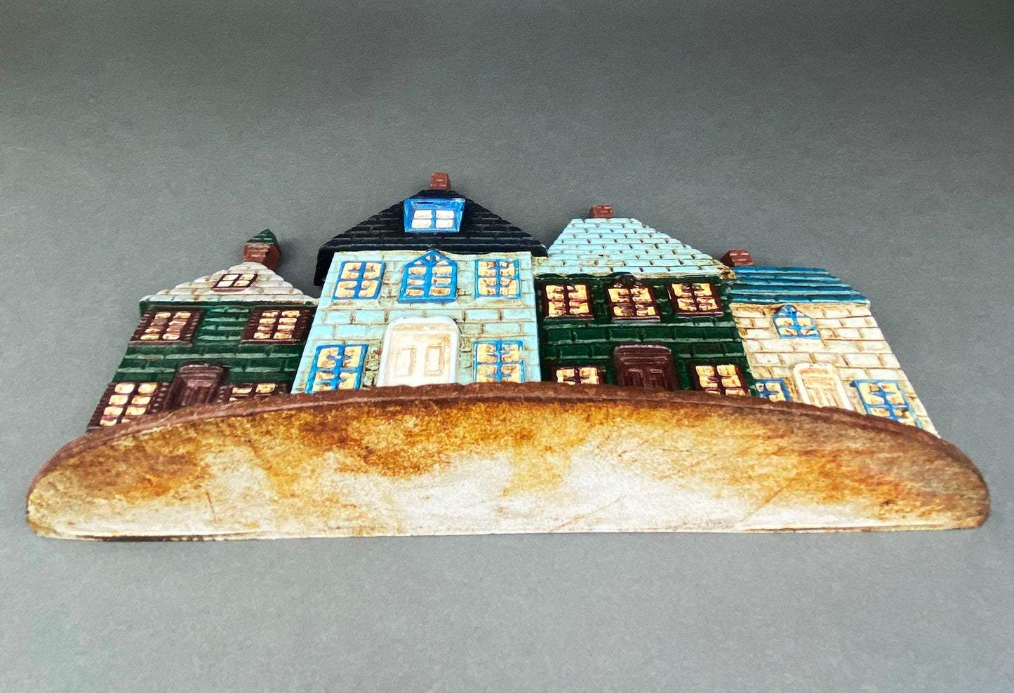 Vintage Cast Iron Door Stopper Shaped like Row of Houses