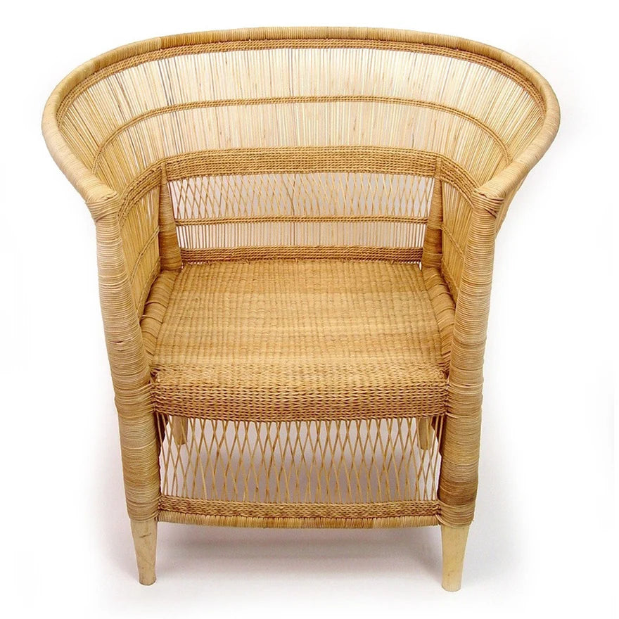 A natural woven rattan armchair with a curved backrest, woven seat, and four legs, shown against a plain white background.